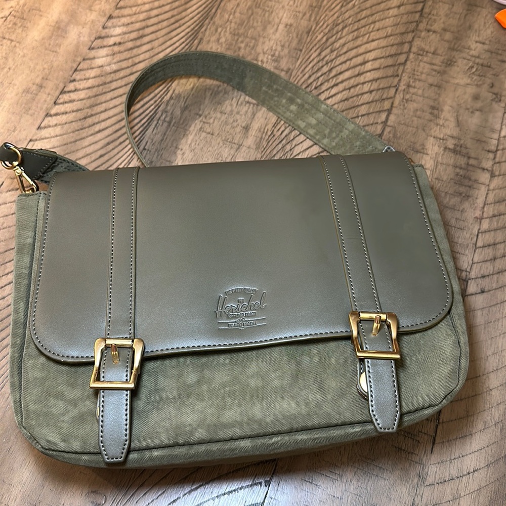 Green Herschel messenger bag crossbody gold buckle detail olive